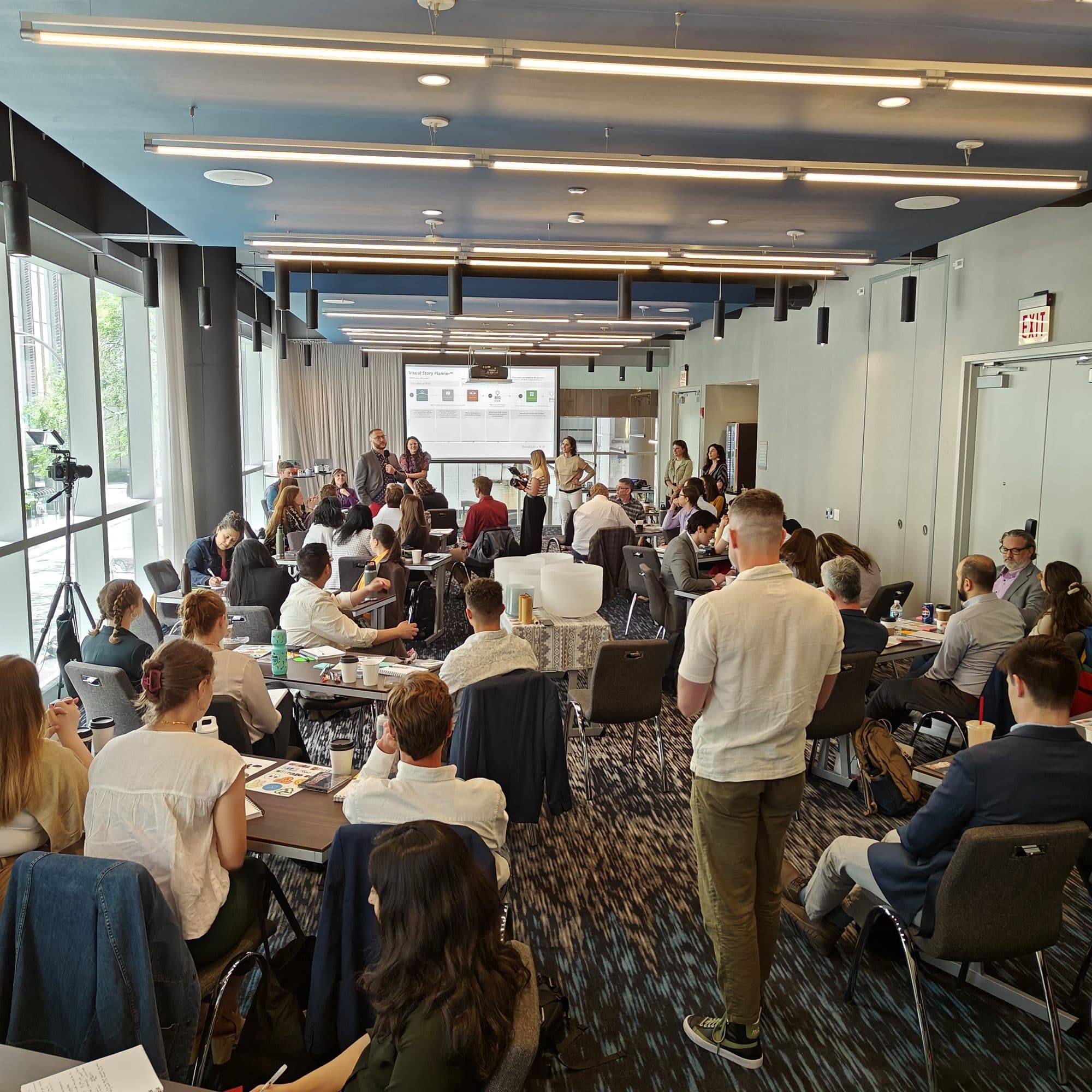 A full conference room at WAP Sustainability's team retreat in Chicago, the bowls set up among the tables